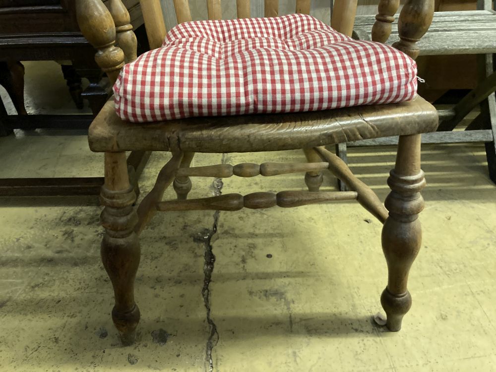 A Victorian elm and beech lathe back Windsor armchair, width 57cm, depth 50cm, height 160cm